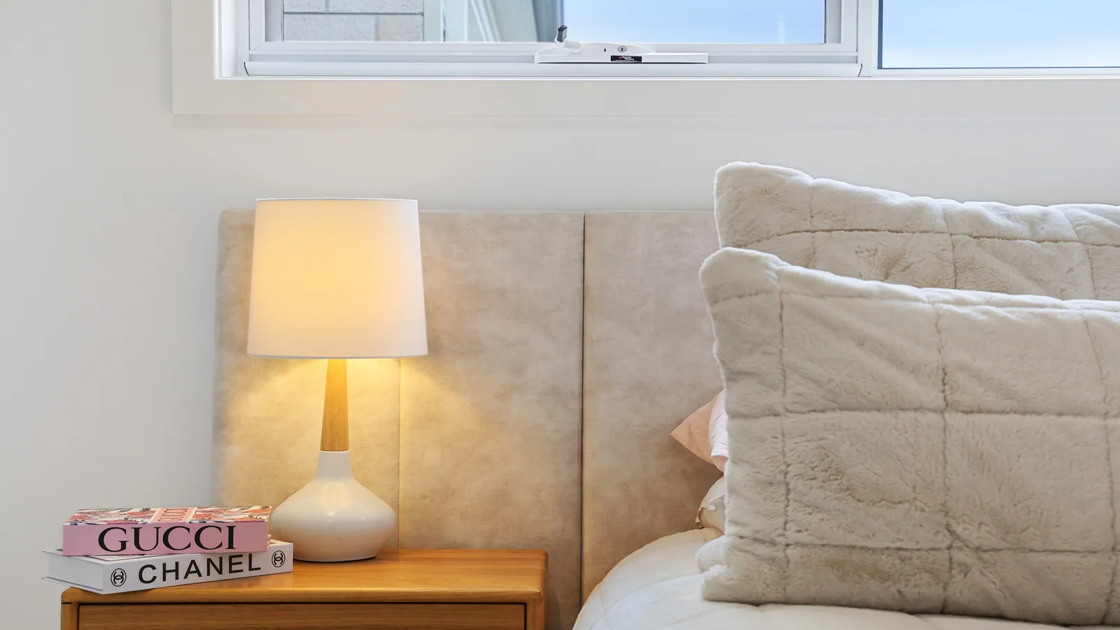 Bedroom detail with bedside lamp