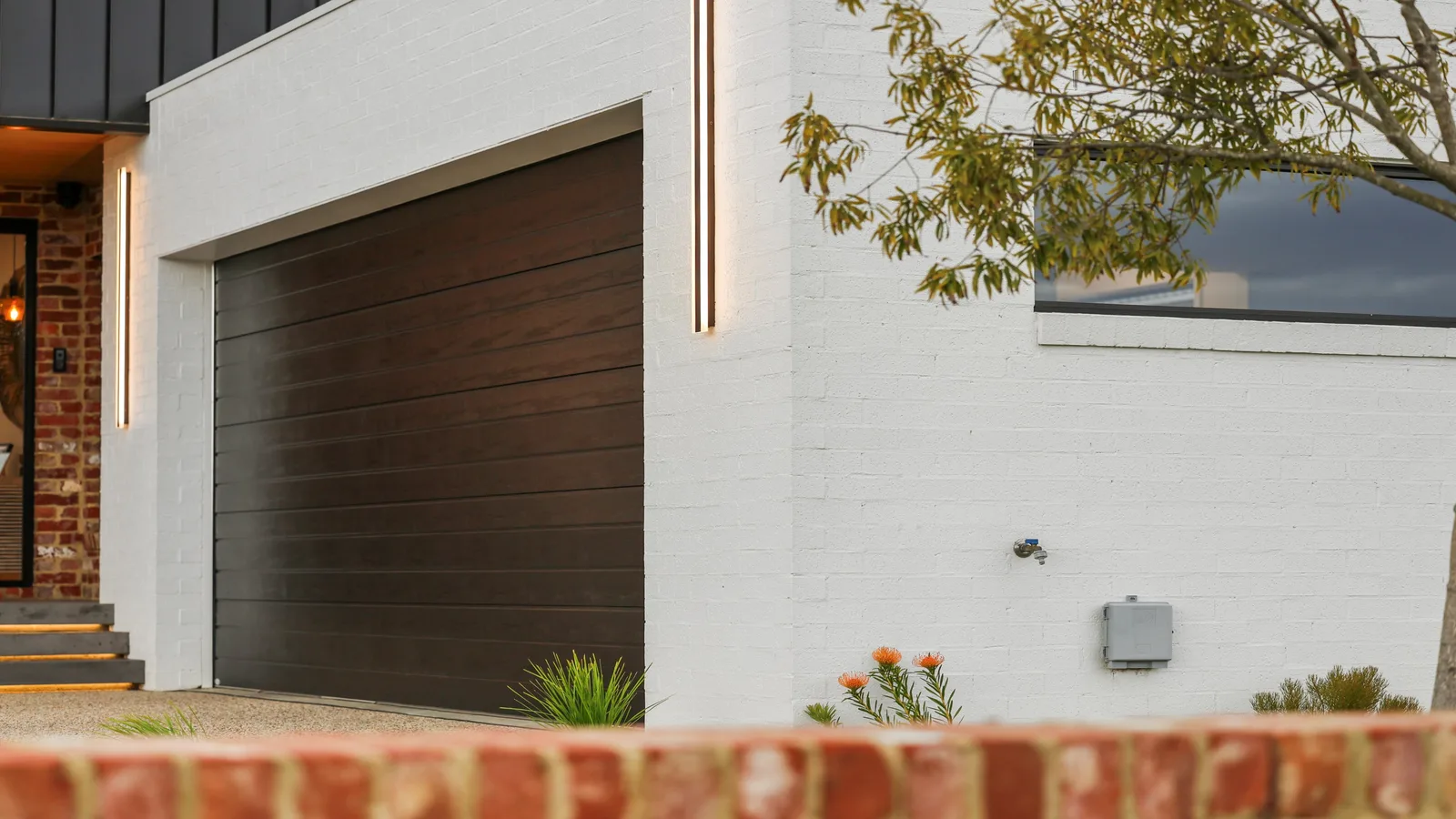 Modern home facade with garage entry